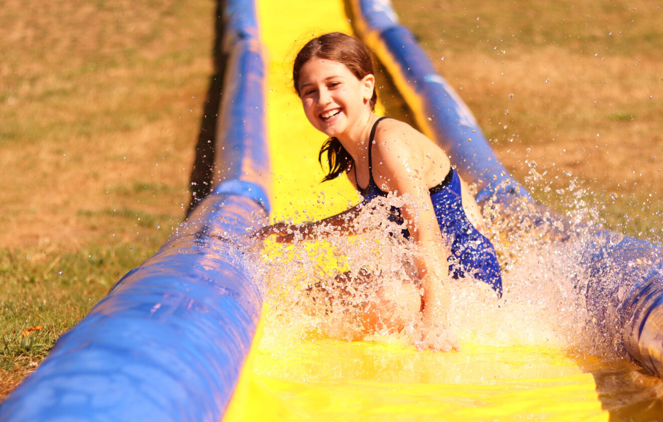girl on water slide.