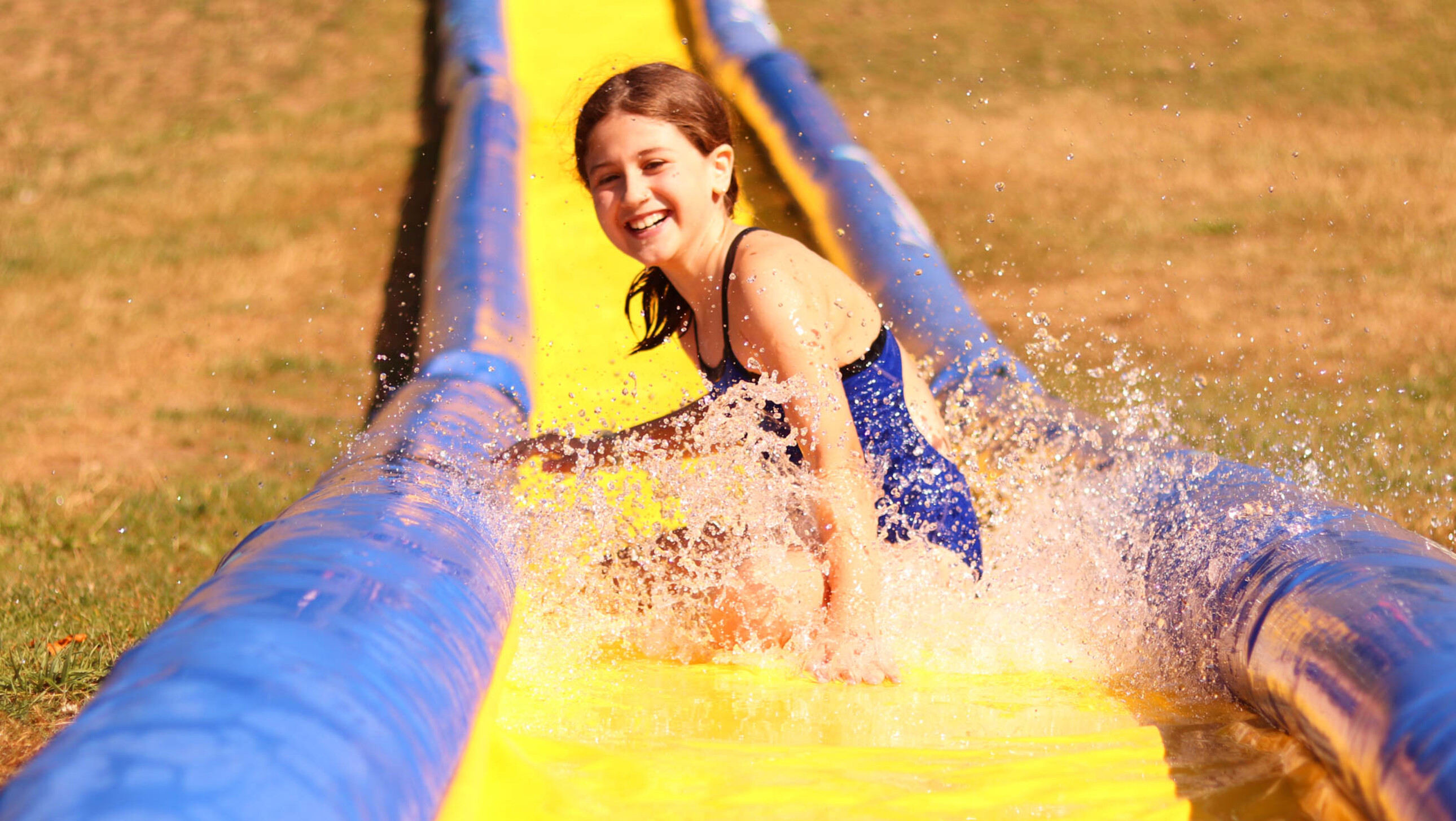 girl on water slide.