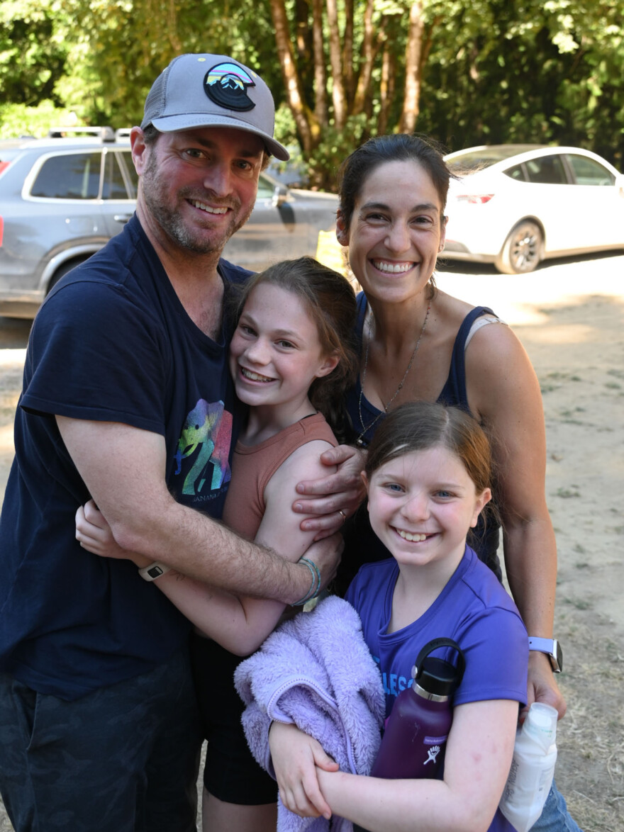 parents with their two daughters.