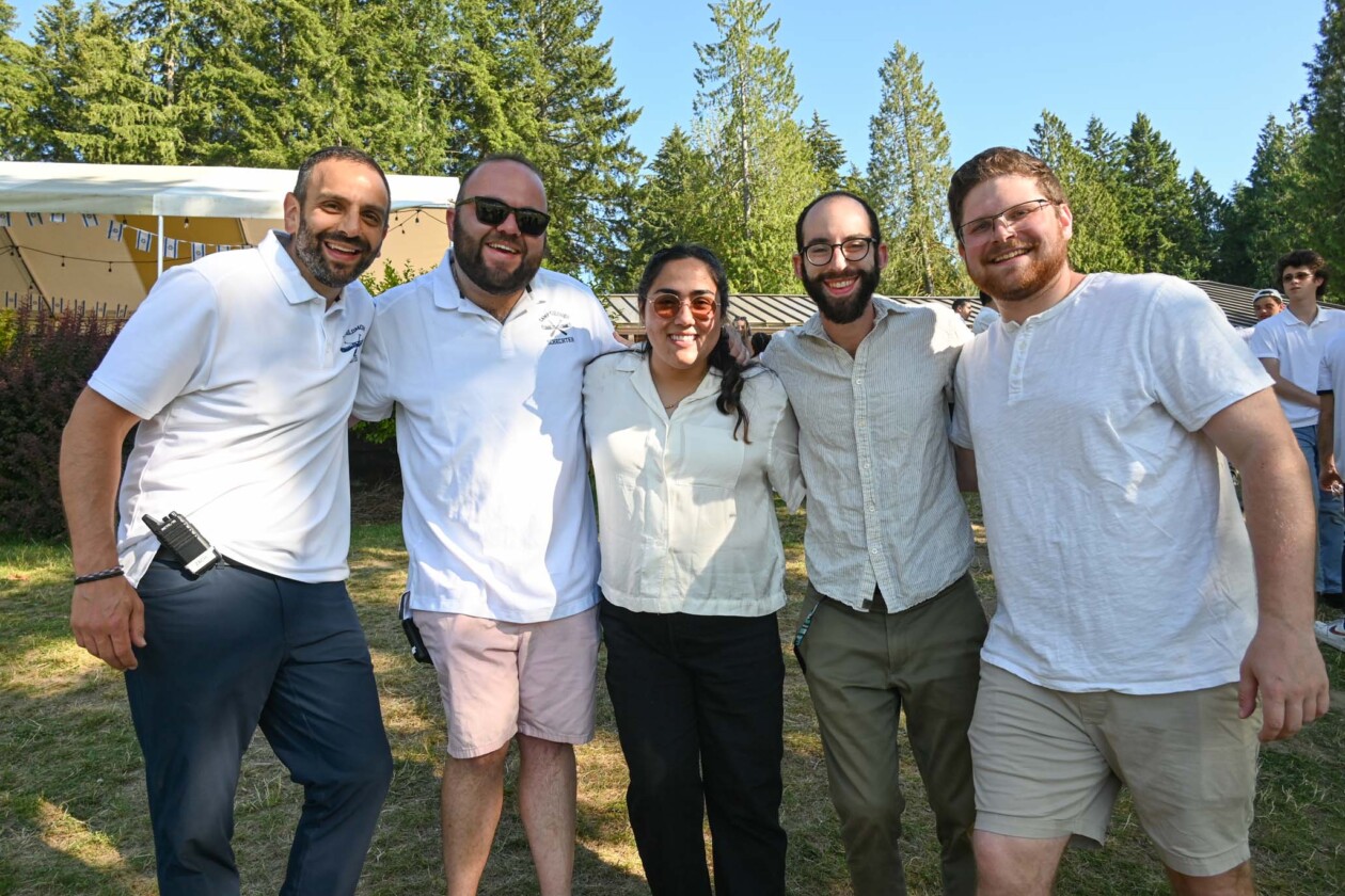 camp staff smiling.